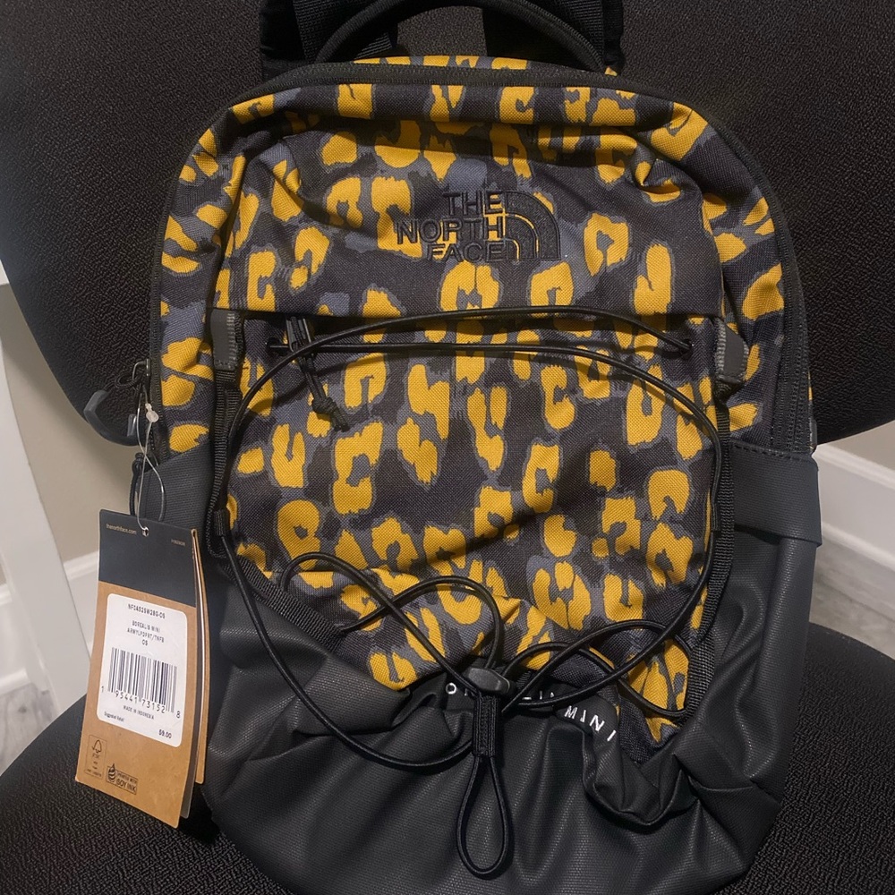 The North Face Mini Backpack - Yellow and Black Leopard Print